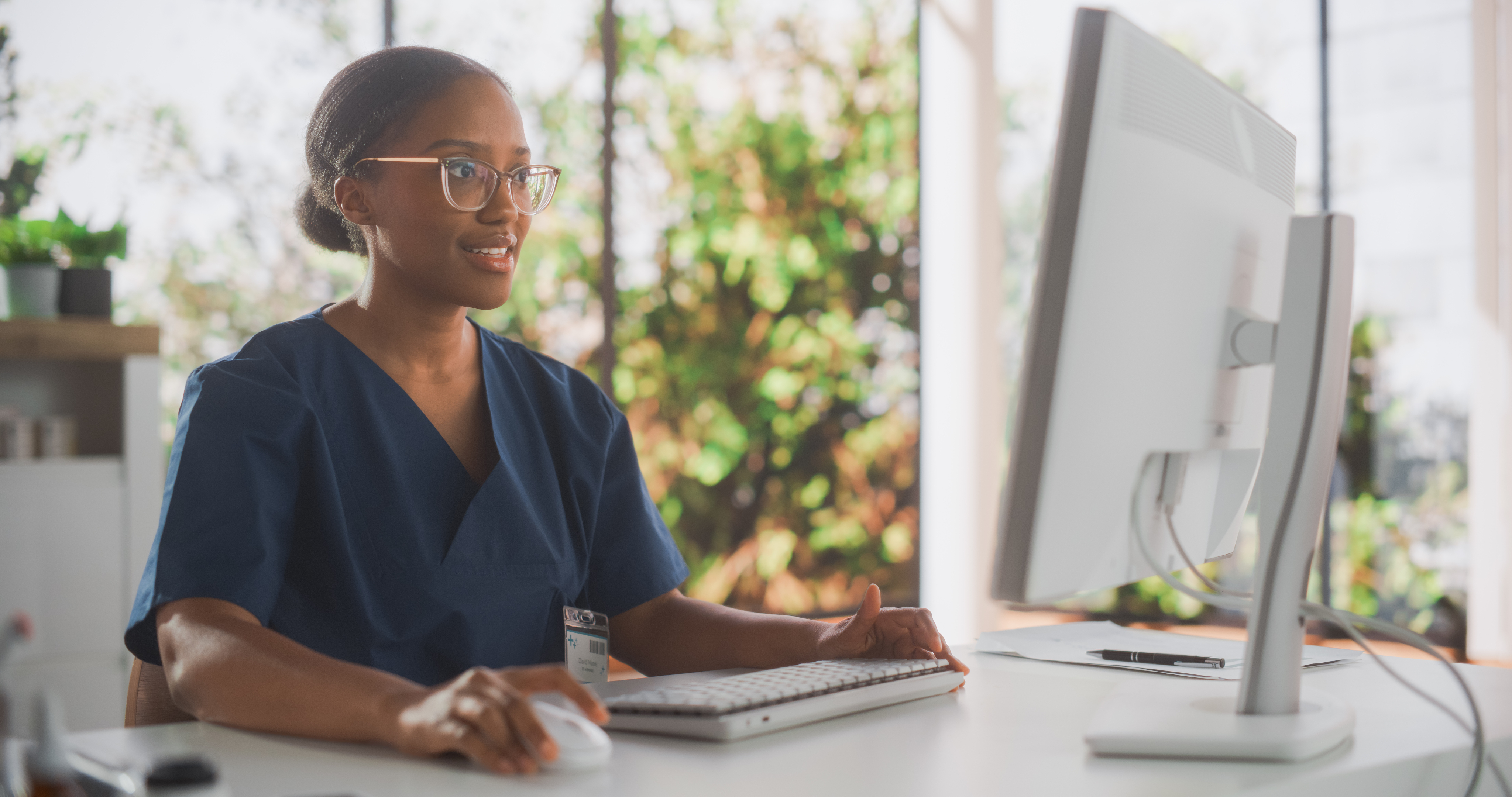 Dental professional documenting with Noted-Dent